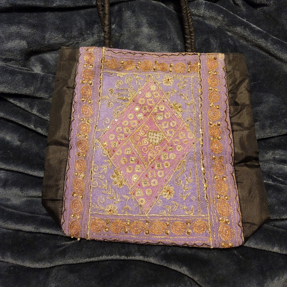 Purple bag made from a sari